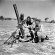 Personnel of the Saskatoon Light Infantry (M.G.) with a 4.2-inch mortar, Militello, Italy, August 22, 1943 / Des membres du Saskatoon Light Infantry (M.G.) avec un mortier de 4,2 pouces à Militello (Italie), le 22 août 1943